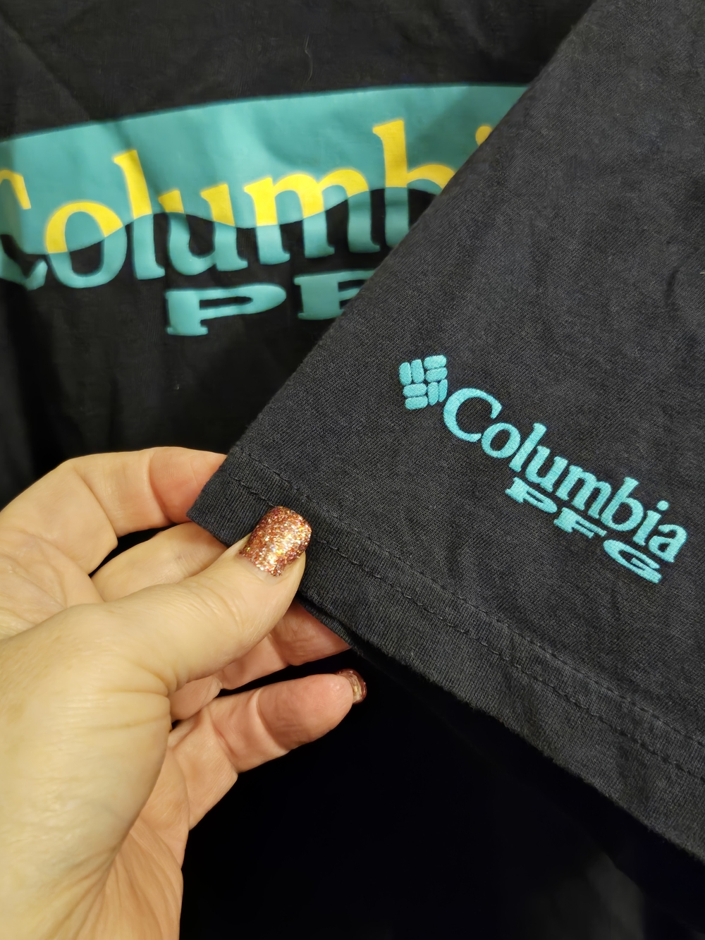 Columbia Black Tee with Teal Stripe and Yellow Logo